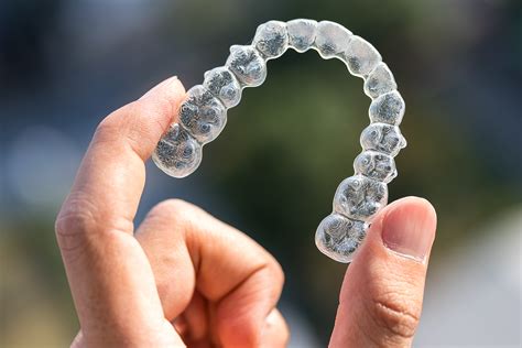 Invisalign® Aligners & Braces .